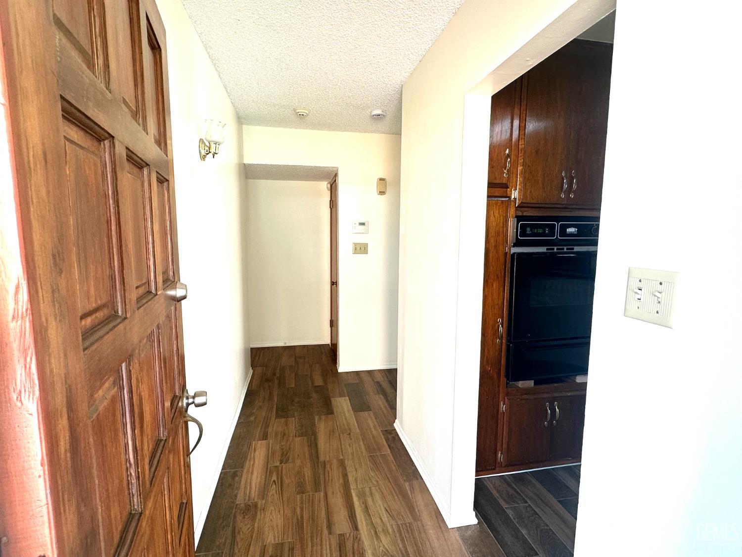 Undisclosed Address Delano, CA 93215 - Photo 10 of 14 a view of a hallway