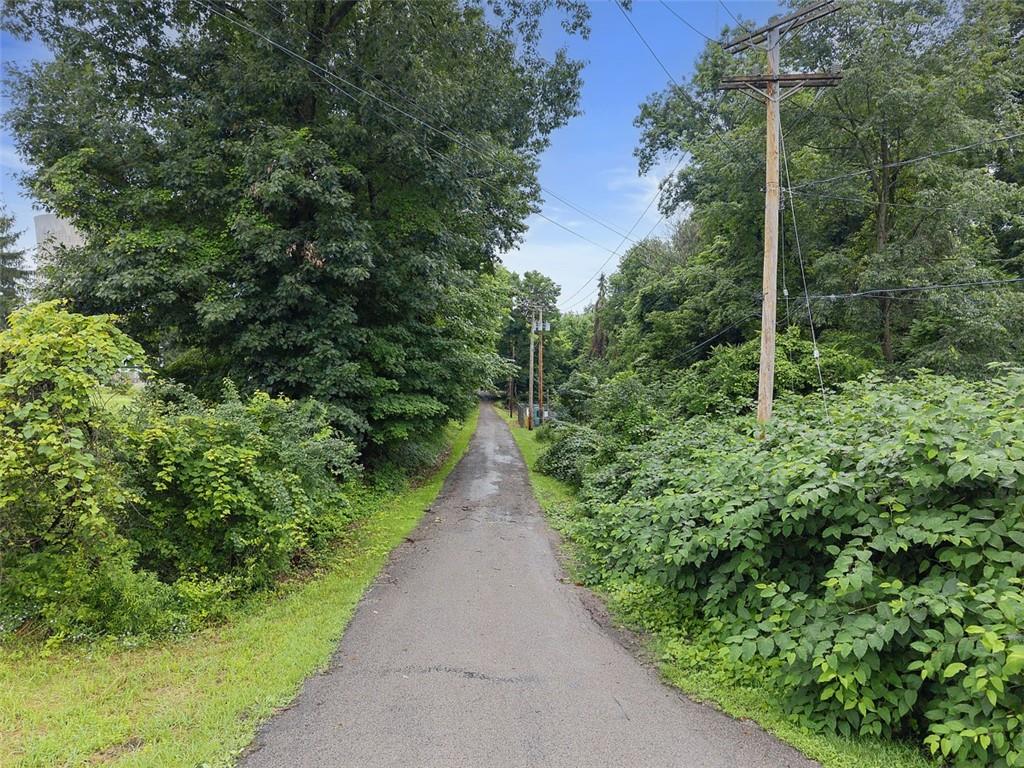 199 Allison Road Shippingport, PA 15077 - Photo 2 of 15 a view of a pathway of a park with plants