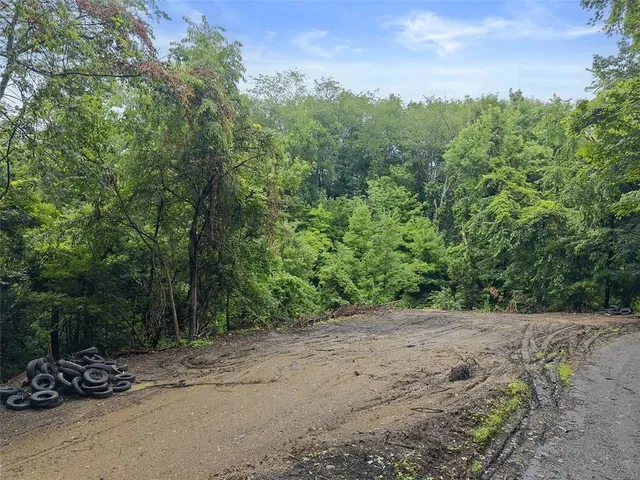 a view of a street with some trees