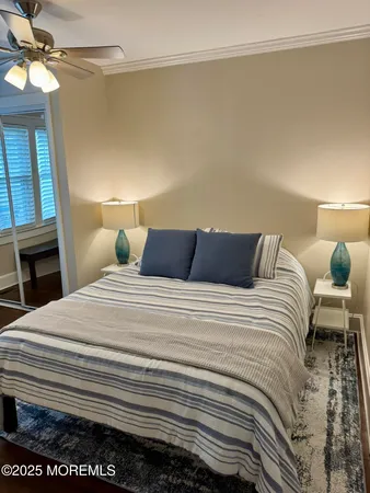 a bedroom with a bed and a fireplace
