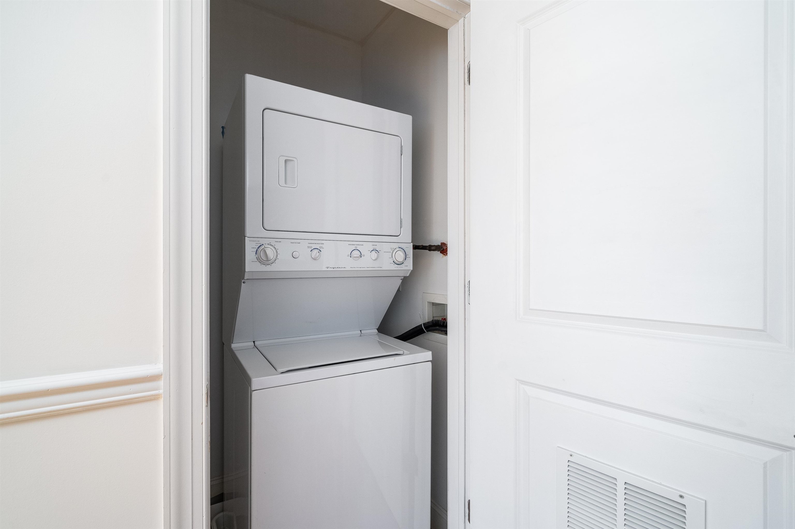 85 Maple Street, Unit 2L Weehawken, NJ 07086 - Photo 7 of 11 a utility room with dryer and washer
