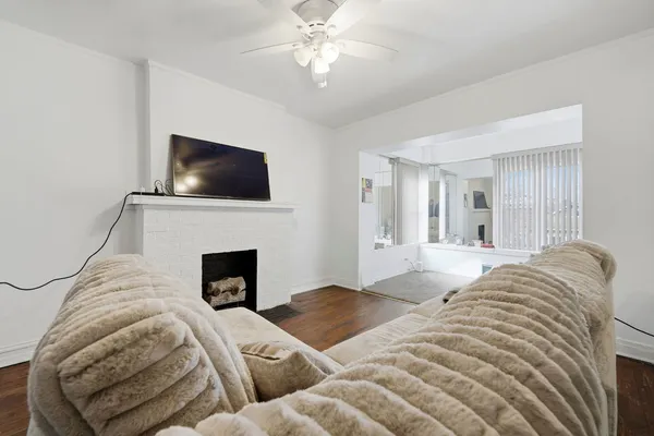 a bedroom with a bed and a fireplace