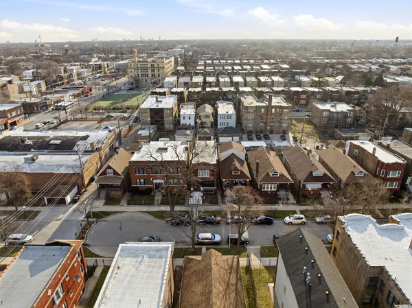 an aerial view of a city with lots of residential buildings