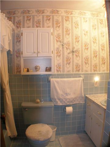 1077 Liberty Road Winchester, TN 37398 - Photo 19 of 20 Hall bath has tile and tub/shower combo.