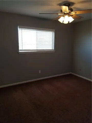 a view of a livingroom with a fan