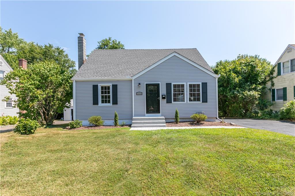 755 Stratford Road Stratford, CT 06615 - Photo 1 of 1 a backyard of a house with table and chairs