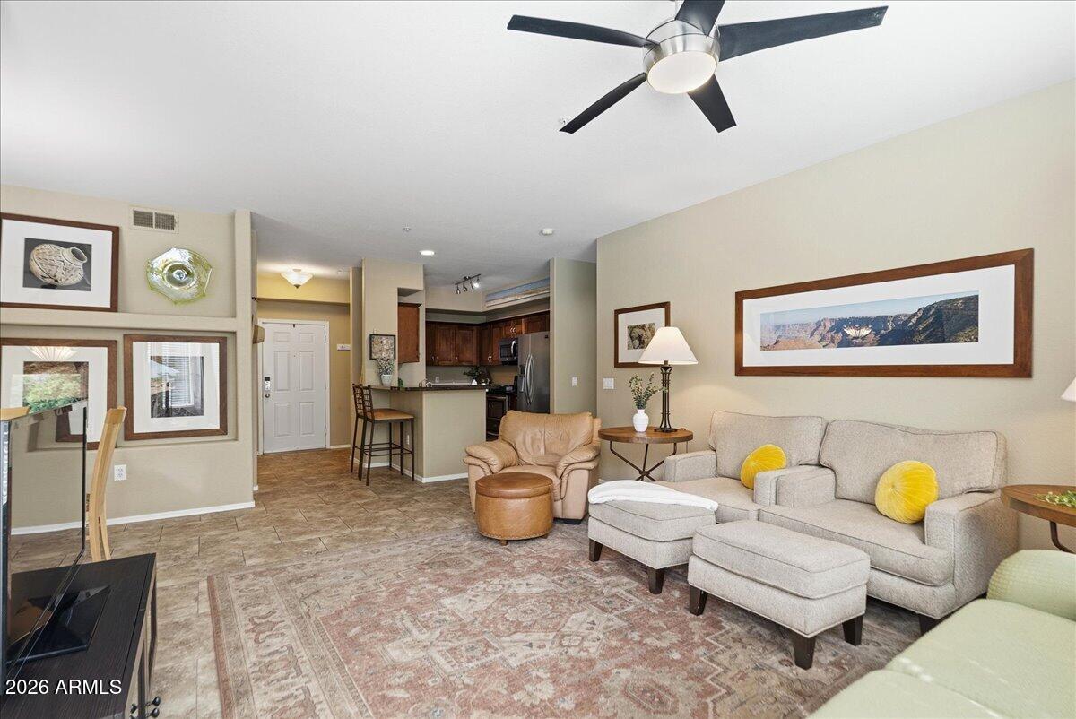 435 West Rio Salado Parkway, Unit 111 Tempe, AZ 85281 - Photo 14 of 44 a living room with furniture and kitchen view