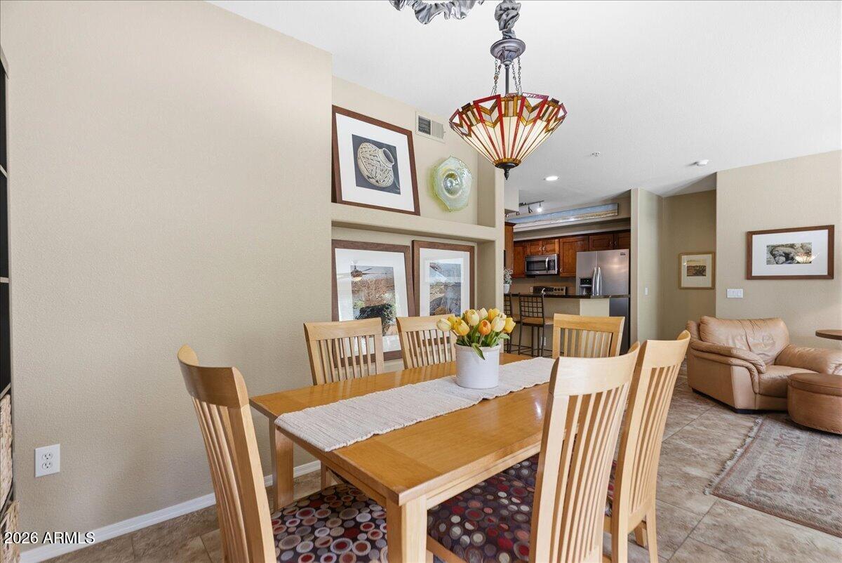 435 West Rio Salado Parkway, Unit 111 Tempe, AZ 85281 - Photo 18 of 44 a view of a dining room with furniture