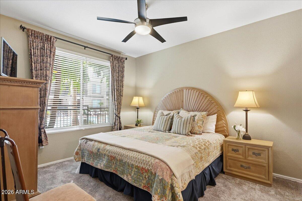 435 West Rio Salado Parkway, Unit 111 Tempe, AZ 85281 - Photo 24 of 44 a bedroom with a bed a lamp and a large window