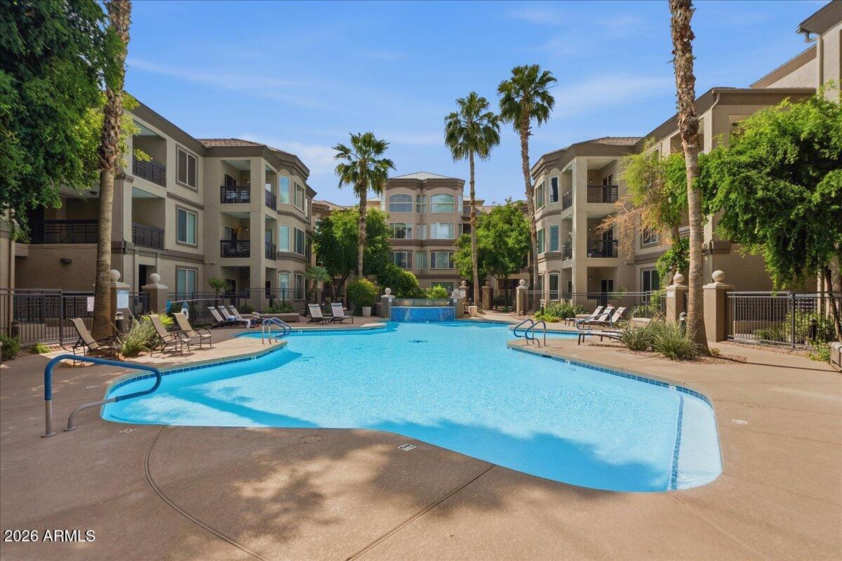 435 West Rio Salado Parkway, Unit 111 Tempe, AZ 85281 - Photo 37 of 44 a view of a house with swimming pool and sitting area