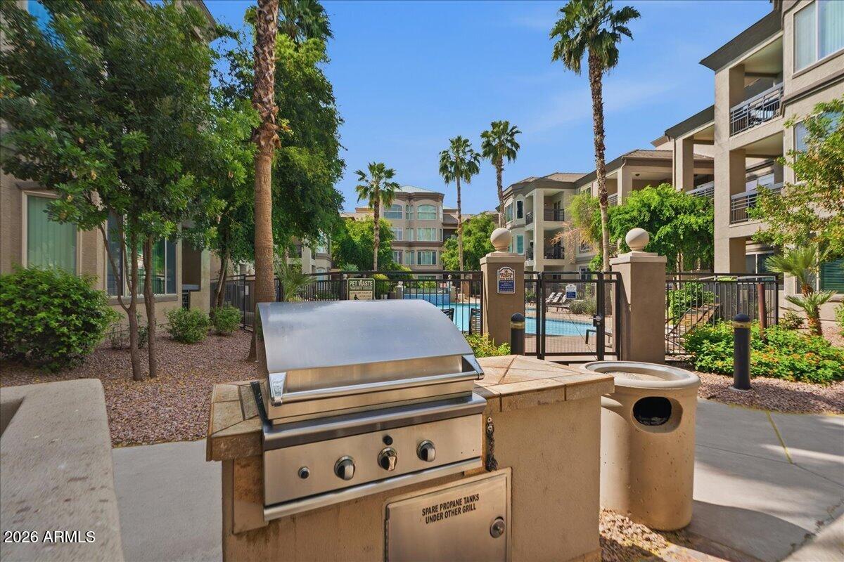 435 West Rio Salado Parkway, Unit 111 Tempe, AZ 85281 - Photo 40 of 44 a view of a patio with table and chairs and potted plants