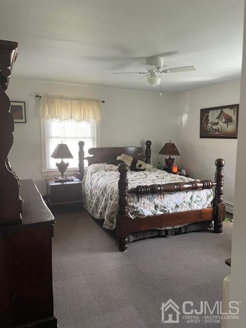 100 Valley Road Colonia, NJ 07067 - Photo 13 of 18 a bedroom with bed window and couch