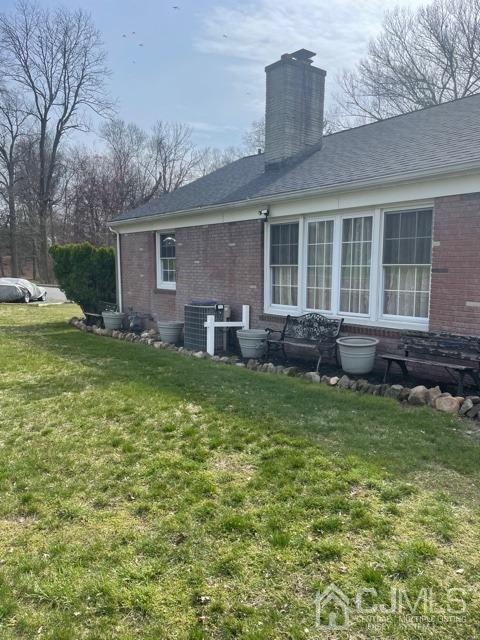 100 Valley Road Colonia, NJ 07067 - Photo 3 of 18 a house view with a garden space