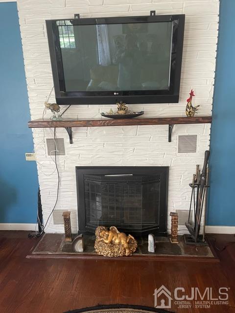 100 Valley Road Colonia, NJ 07067 - Photo 9 of 18 a living room with furniture and a fireplace
