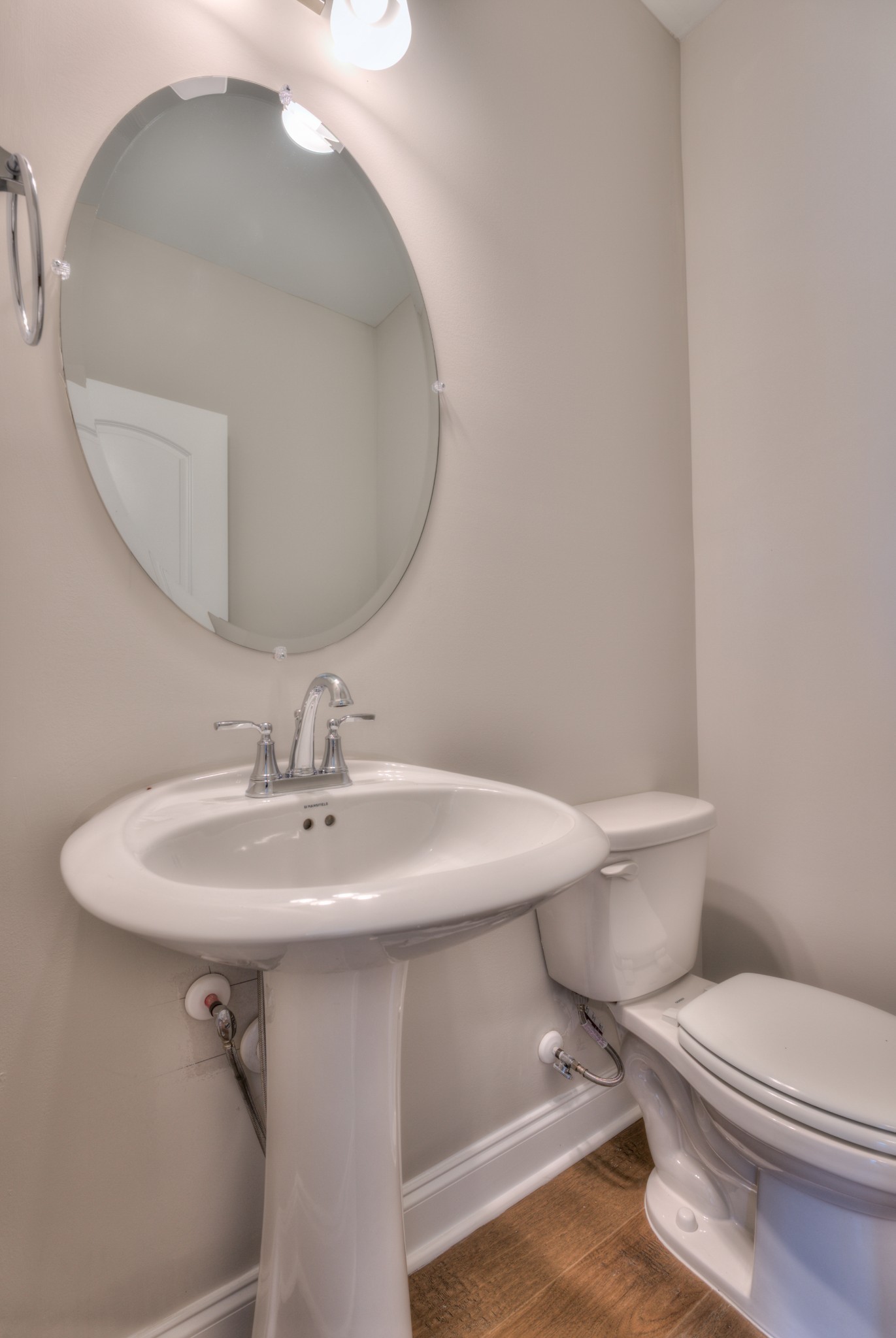 9012 Headwaters Drive Franklin, TN 37064 - Photo 12 of 25 a bathroom with a sink a mirror and a toilet