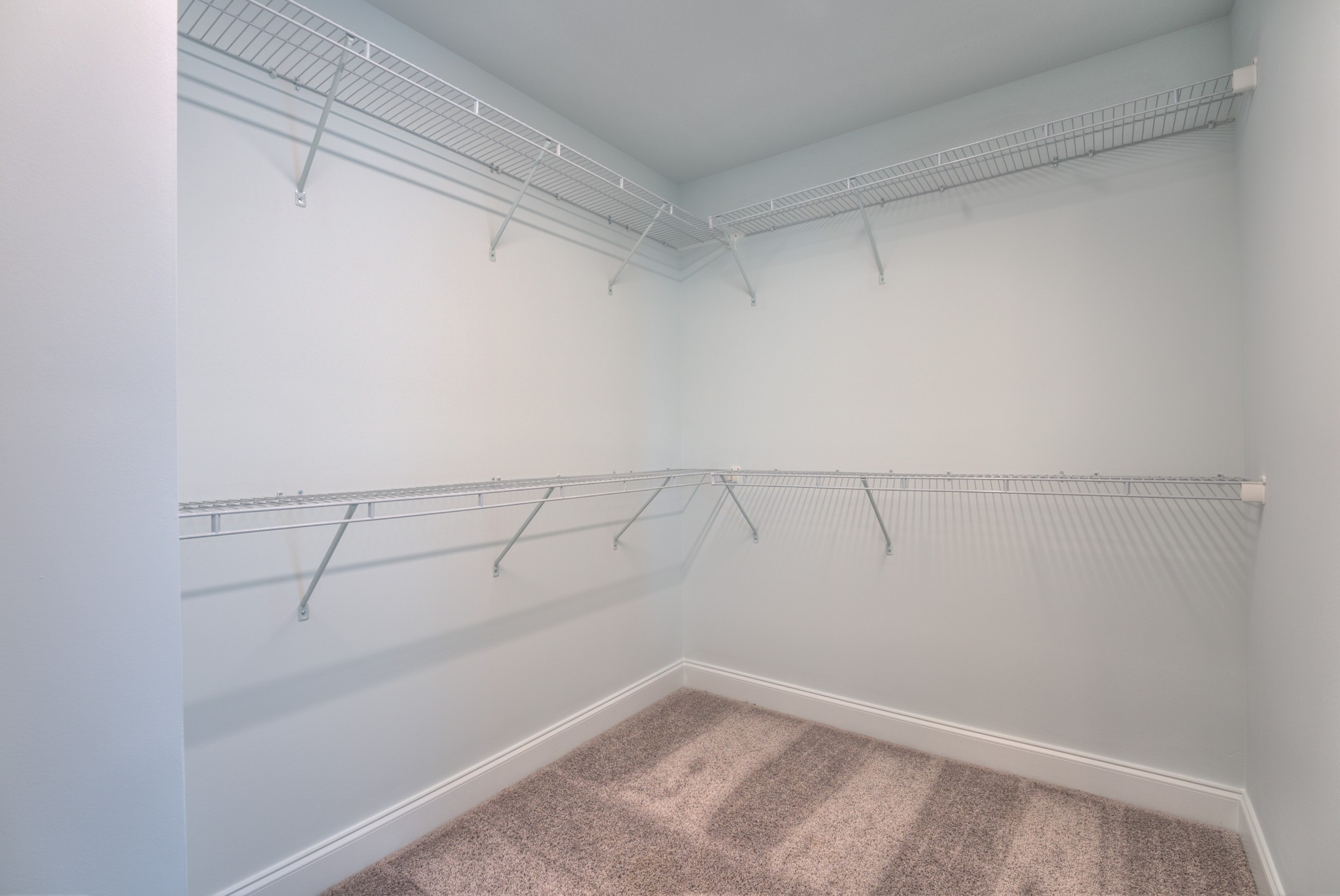 9012 Headwaters Drive Franklin, TN 37064 - Photo 17 of 25 a view of a room with racks on the wall