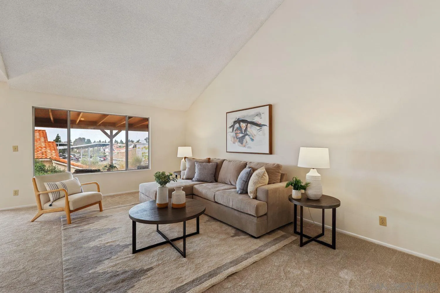 7912 Hemphill Drive San Diego, CA 92126 - Photo 3 of 17 a living room with furniture and a large window