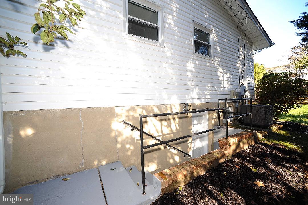 6015 Meriwether Lane Springfield, VA 22150 - Photo 31 of 32 exterior basement walkout