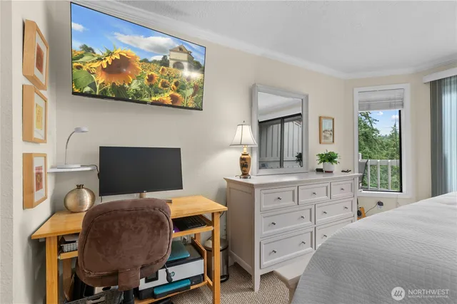 a bedroom with a bed and furniture