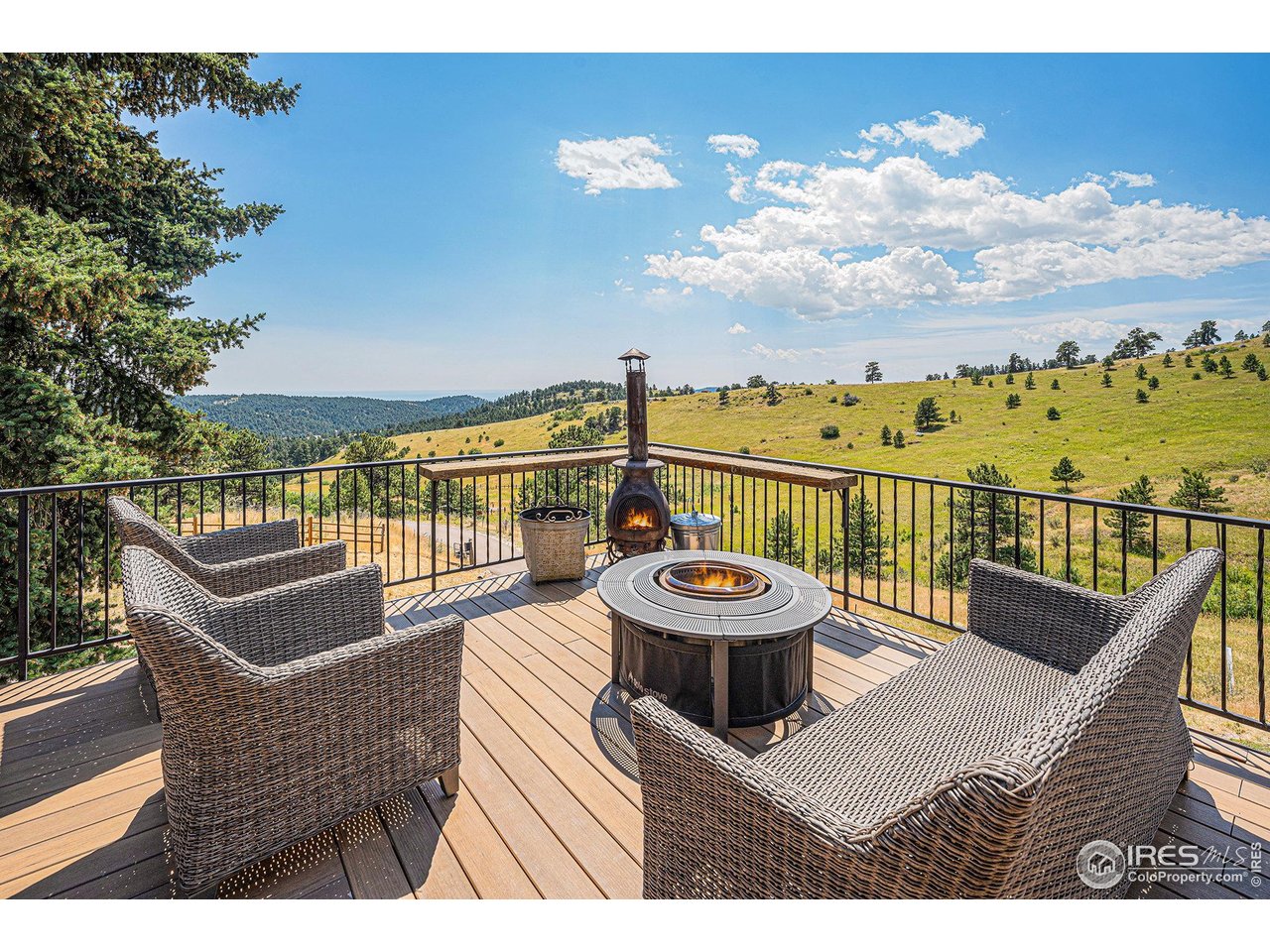 a view of a roof deck with couches
