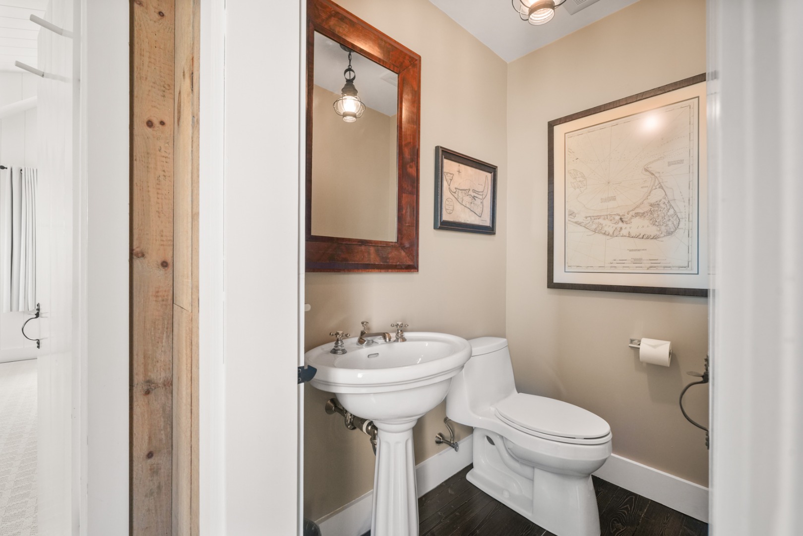 21 Quidnet Road Nantucket, MA 02554 - Photo 30 of 62 a bathroom with a toilet sink and mirror