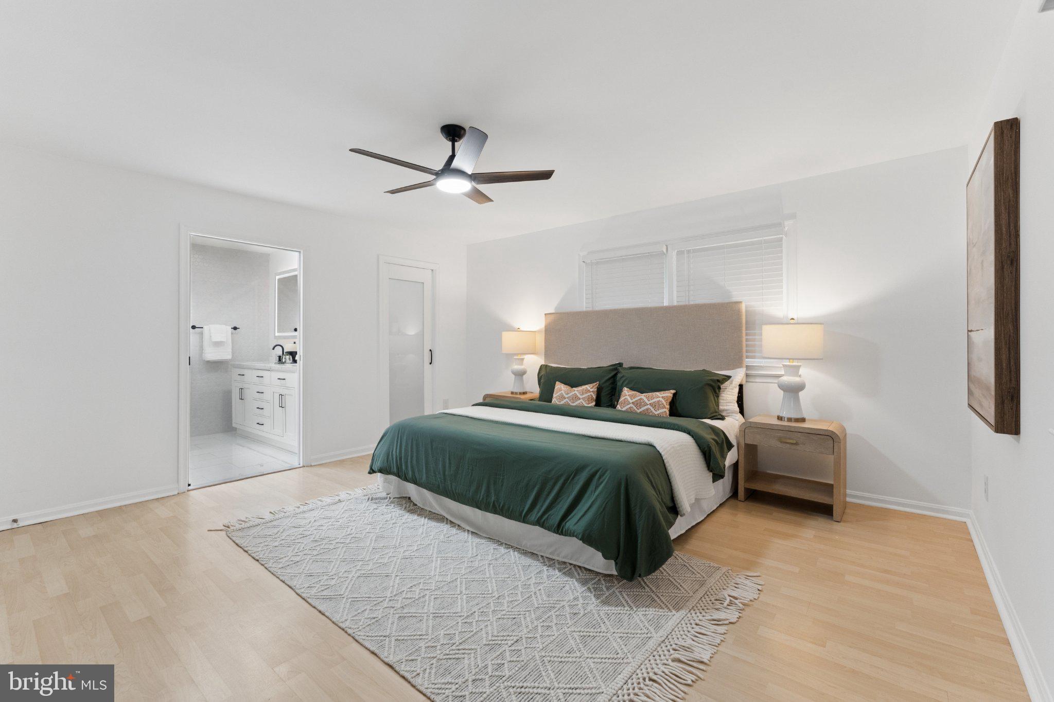 3219 Fox Mill Road Oakton, VA 22124 - Photo 29 of 87 Serene bedroom with modern elegance.