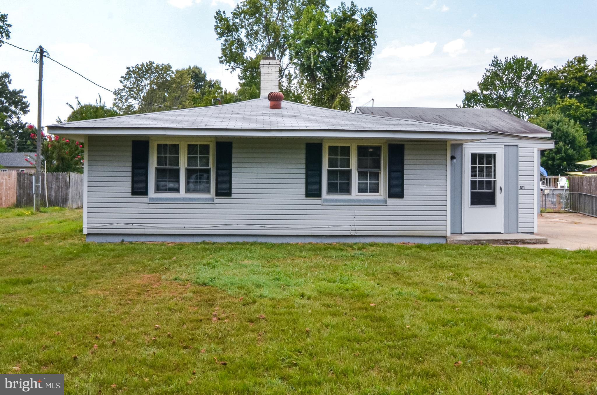 311 Rolando Drive Colonial Beach, VA 22443 - Photo 2 of 24 View of house from Rolando Dr.