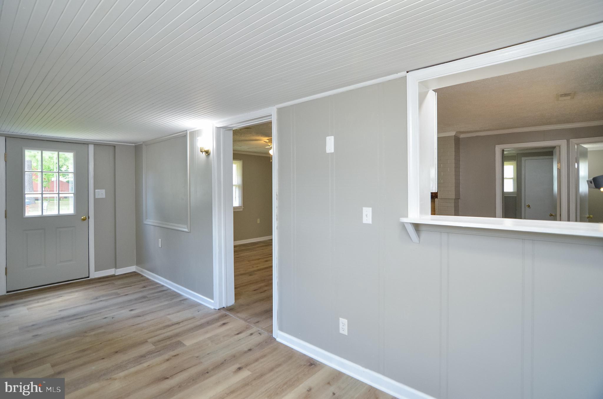 311 Rolando Drive Colonial Beach, VA 22443 - Photo 12 of 24 Hallway or small kitchen table table area.