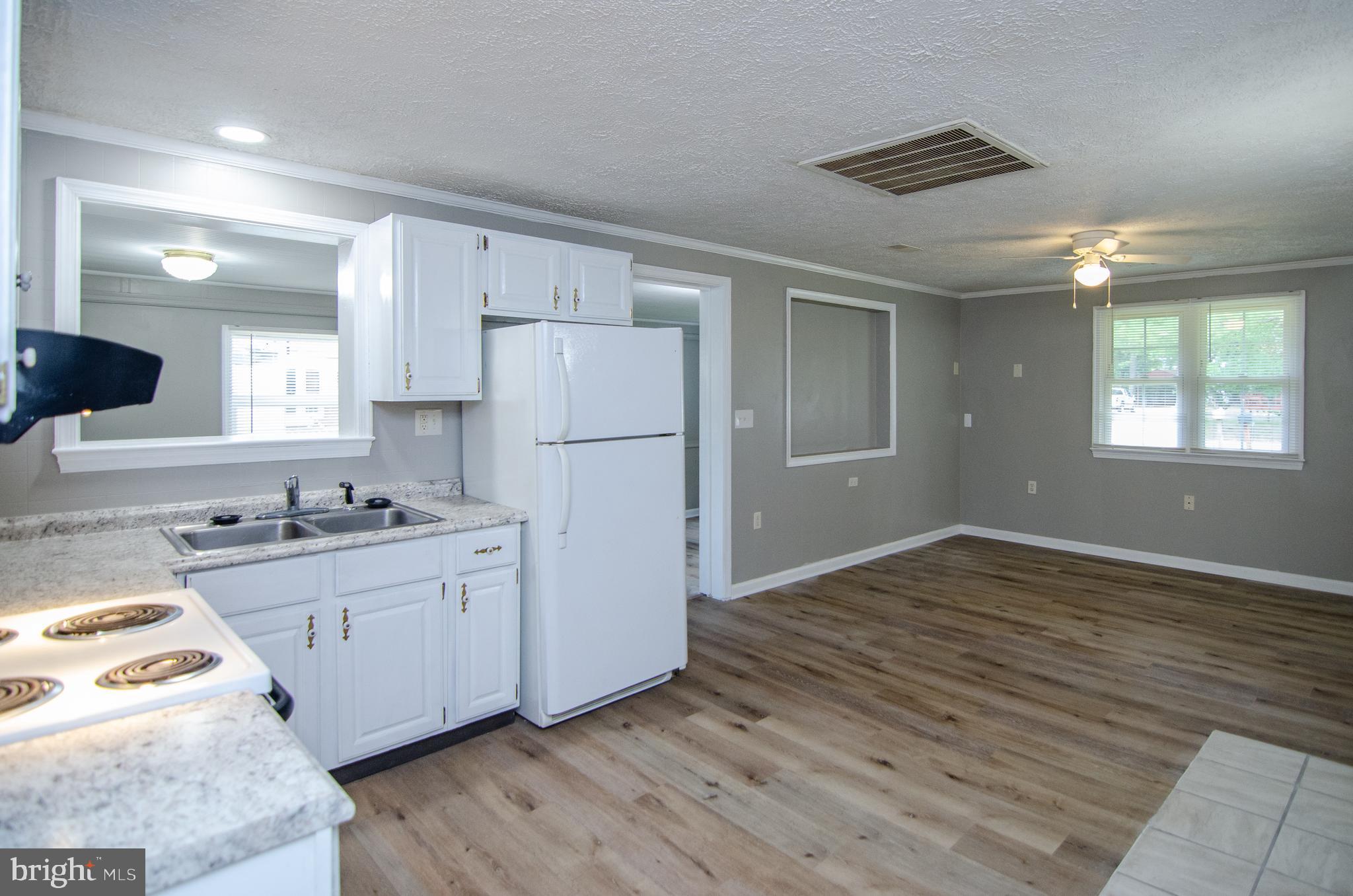 311 Rolando Drive Colonial Beach, VA 22443 - Photo 16 of 24 View of Living room and Kitchen