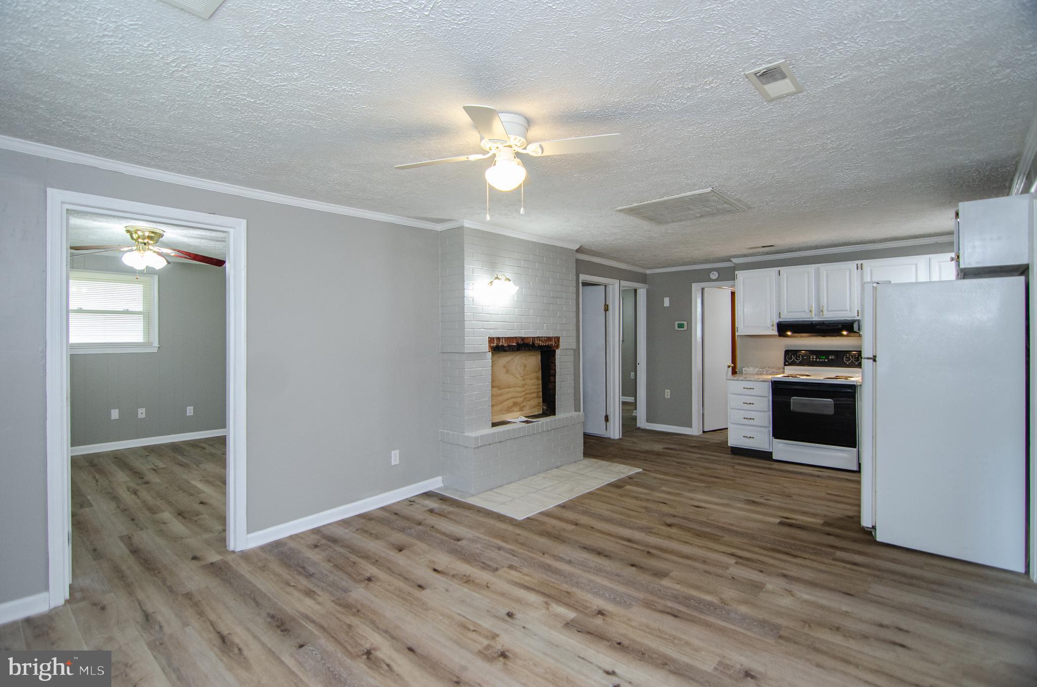 311 Rolando Drive Colonial Beach, VA 22443 - Photo 20 of 24 Living area with fireplace