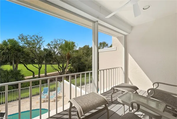 a view of a balcony and chair