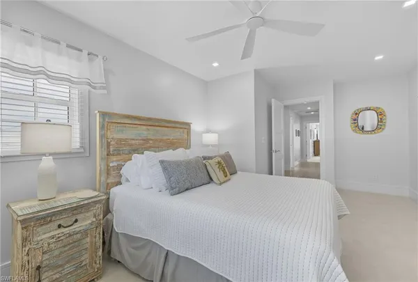 a bedroom with a bed and a cabinets