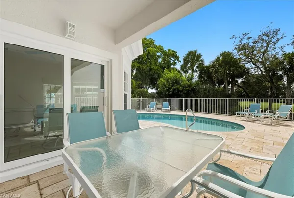 a view of outdoor space and swimming pool
