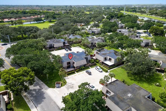 an aerial view of a city with lots of residential buildings