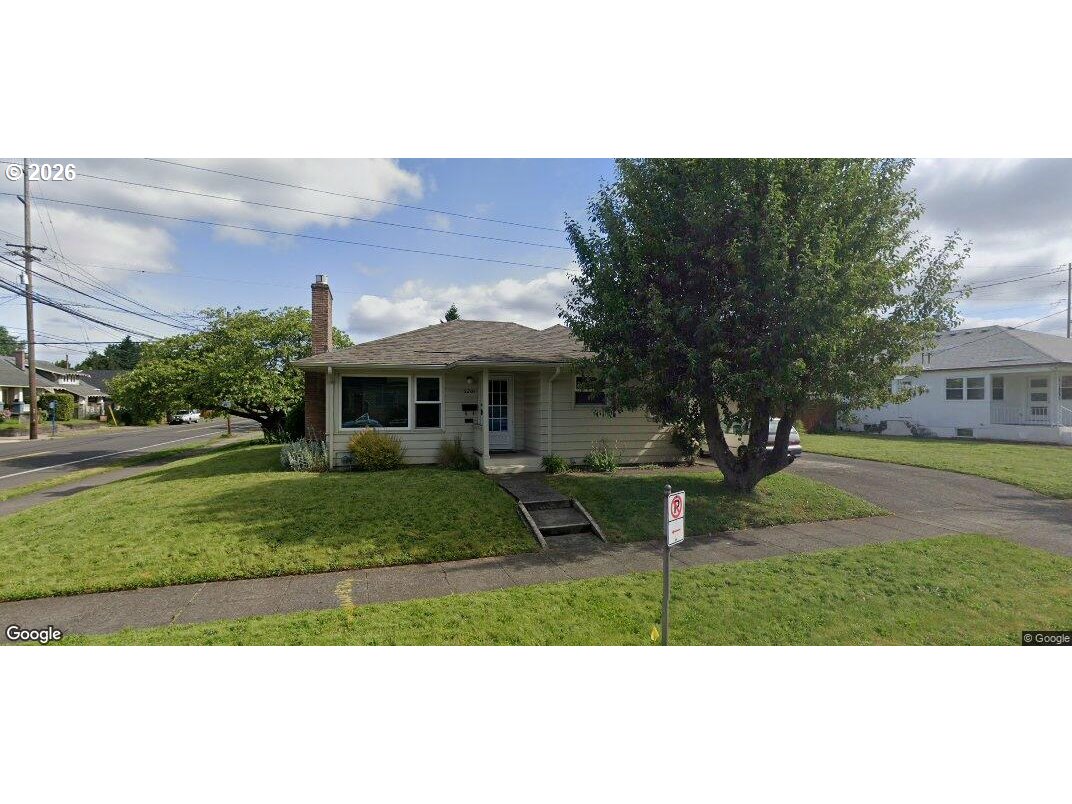 5205 Southeast Ramona Street Portland, OR 97206 - Photo 7 of 10 a view of house with a garden