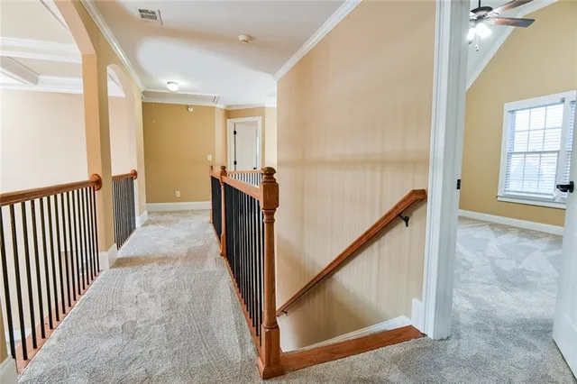 a bathroom with a granite countertop sink a mirror and shower