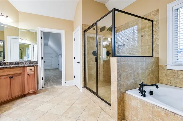 a bathroom with a sink toilet and mirror