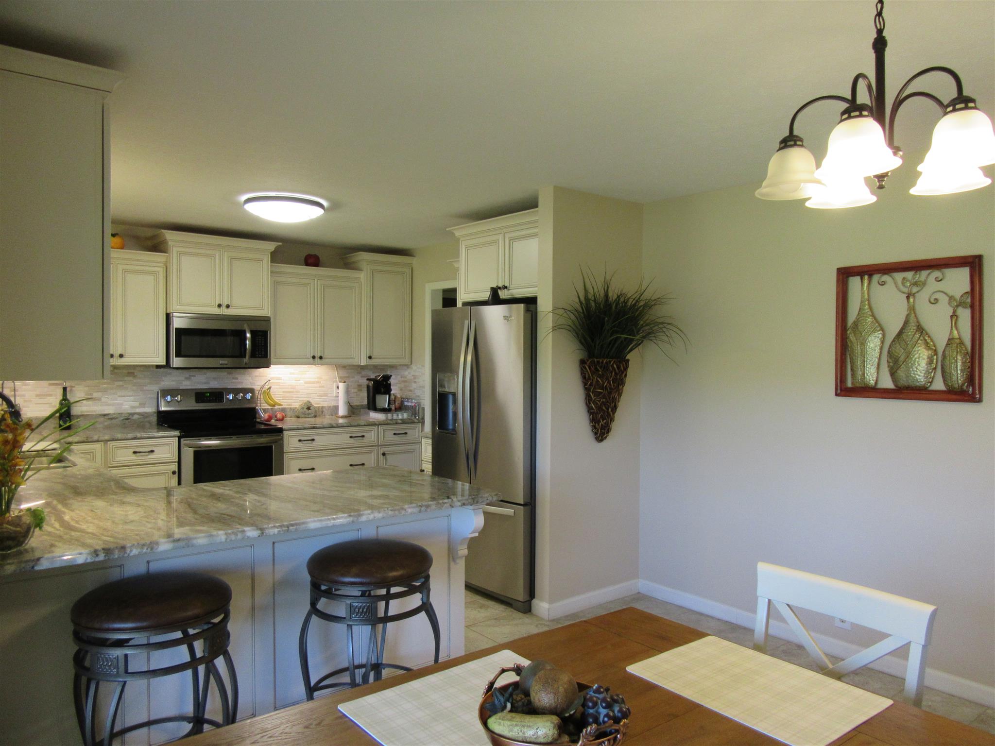 6504 Highway 161 Springfield, TN 37172 - Photo 13 of 30 a kitchen with a refrigerator and a stove top oven
