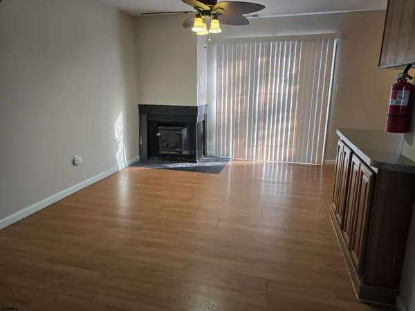 a kitchen with stainless steel appliances granite countertop a stove a refrigerator and a microwave