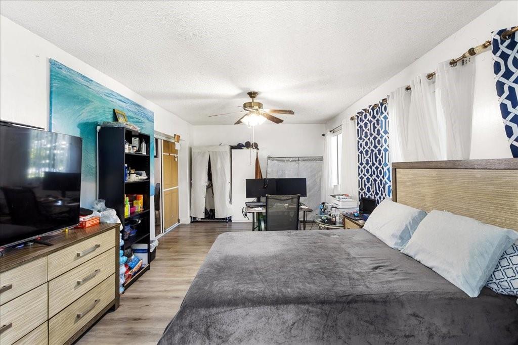 6800 Northwest 75th Drive Tamarac, FL 33321 - Photo 16 of 20 a living room with furniture and a flat screen tv