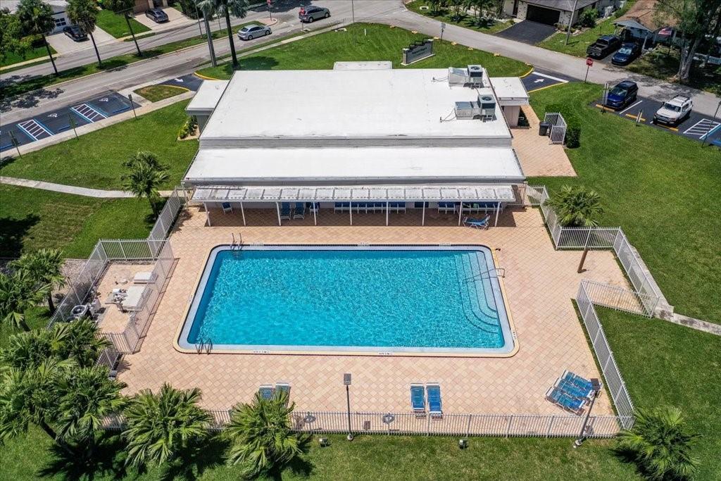 6800 Northwest 75th Drive Tamarac, FL 33321 - Photo 18 of 20 an aerial view of a house with yard swimming pool and outdoor seating