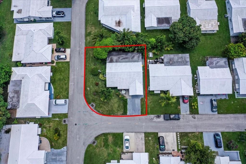 6800 Northwest 75th Drive Tamarac, FL 33321 - Photo 19 of 20 aerial view of a house with a garden and plants