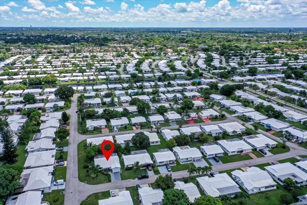 6800 Northwest 75th Drive Tamarac, FL 33321 - Photo 20 of 20 an aerial view of residential houses with outdoor space and swimming pool