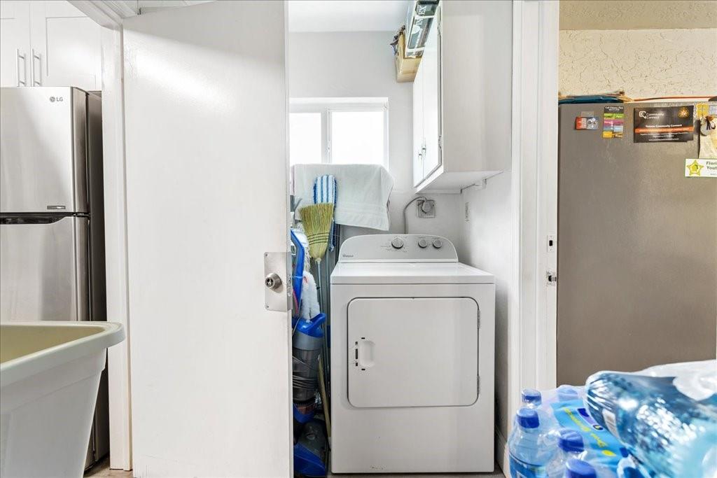 6800 Northwest 75th Drive Tamarac, FL 33321 - Photo 9 of 20 a utility room with dryer and washer