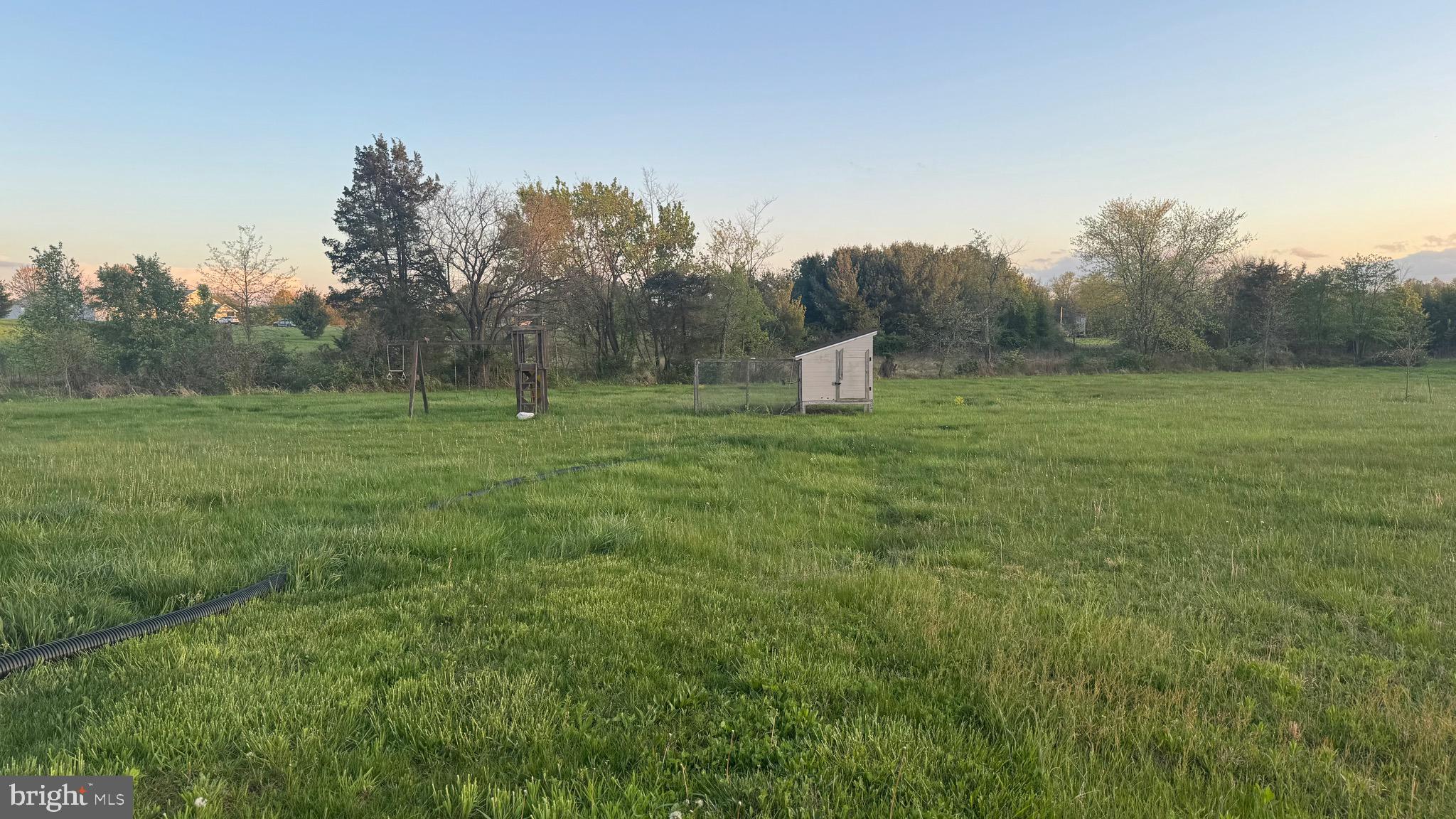 2295 Harney Road Littlestown, PA 17340 - Photo 12 of 37 a backyard of a house with lots of green space