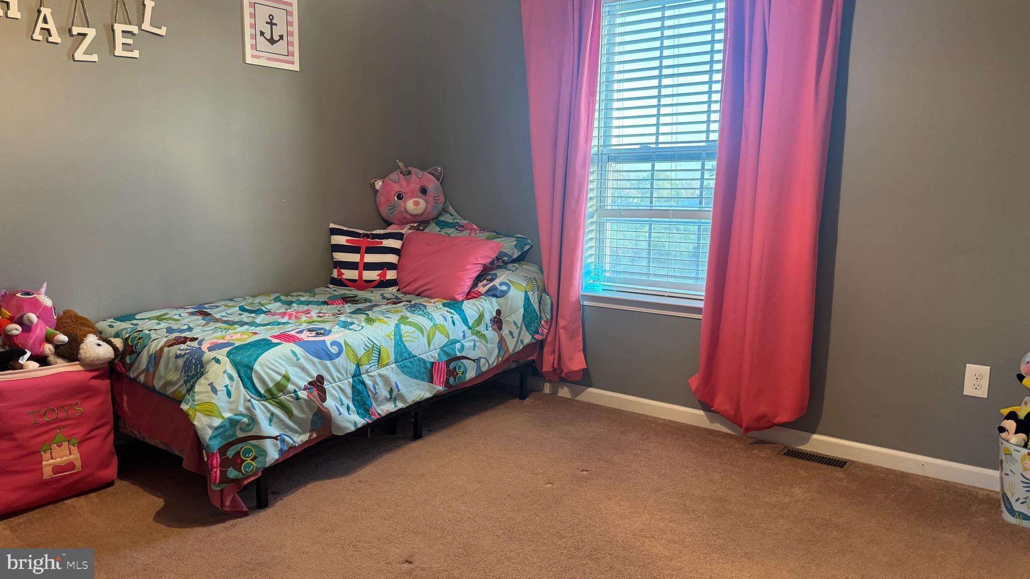 2295 Harney Road Littlestown, PA 17340 - Photo 15 of 37 a bedroom with a bed and window