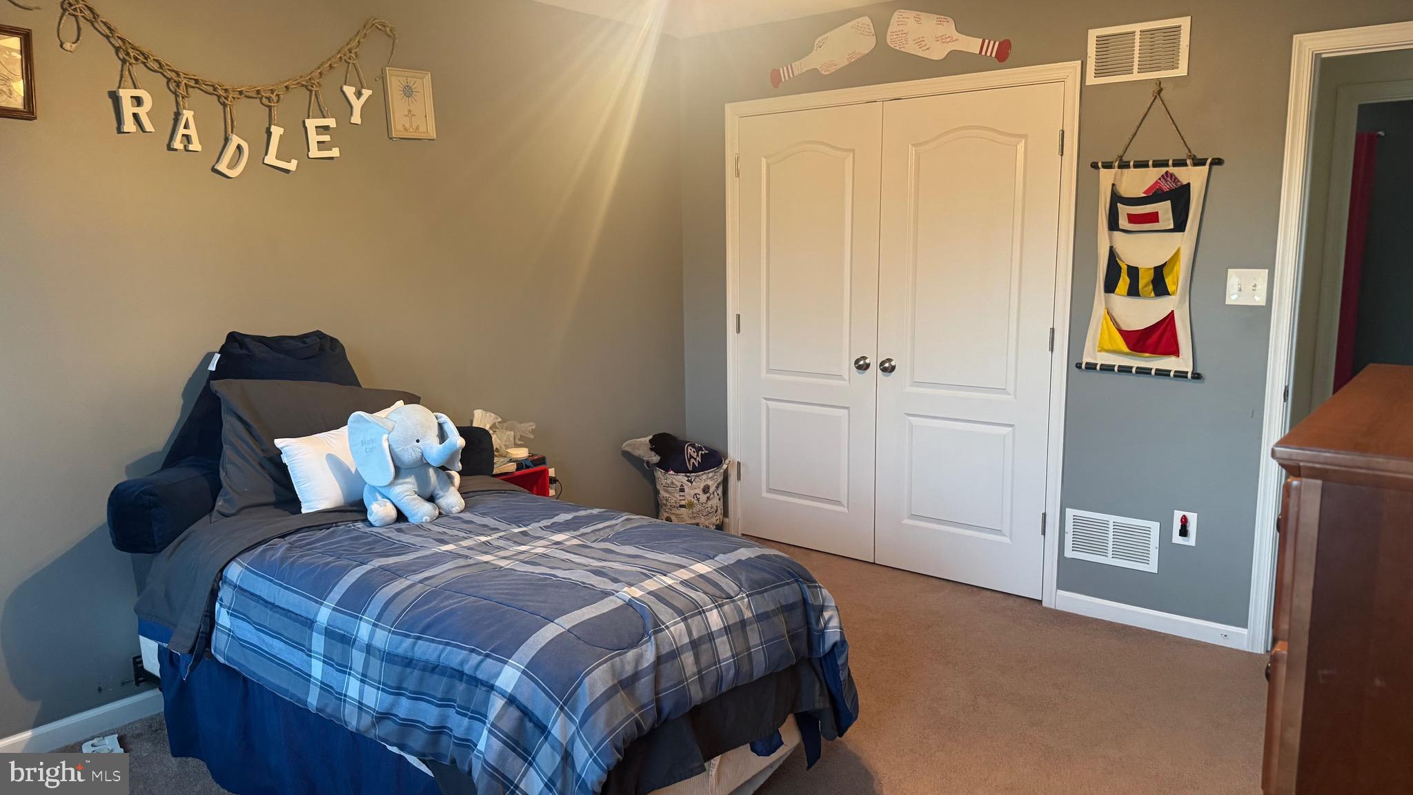 2295 Harney Road Littlestown, PA 17340 - Photo 16 of 37 a bedroom with a bed and painting on the wall
