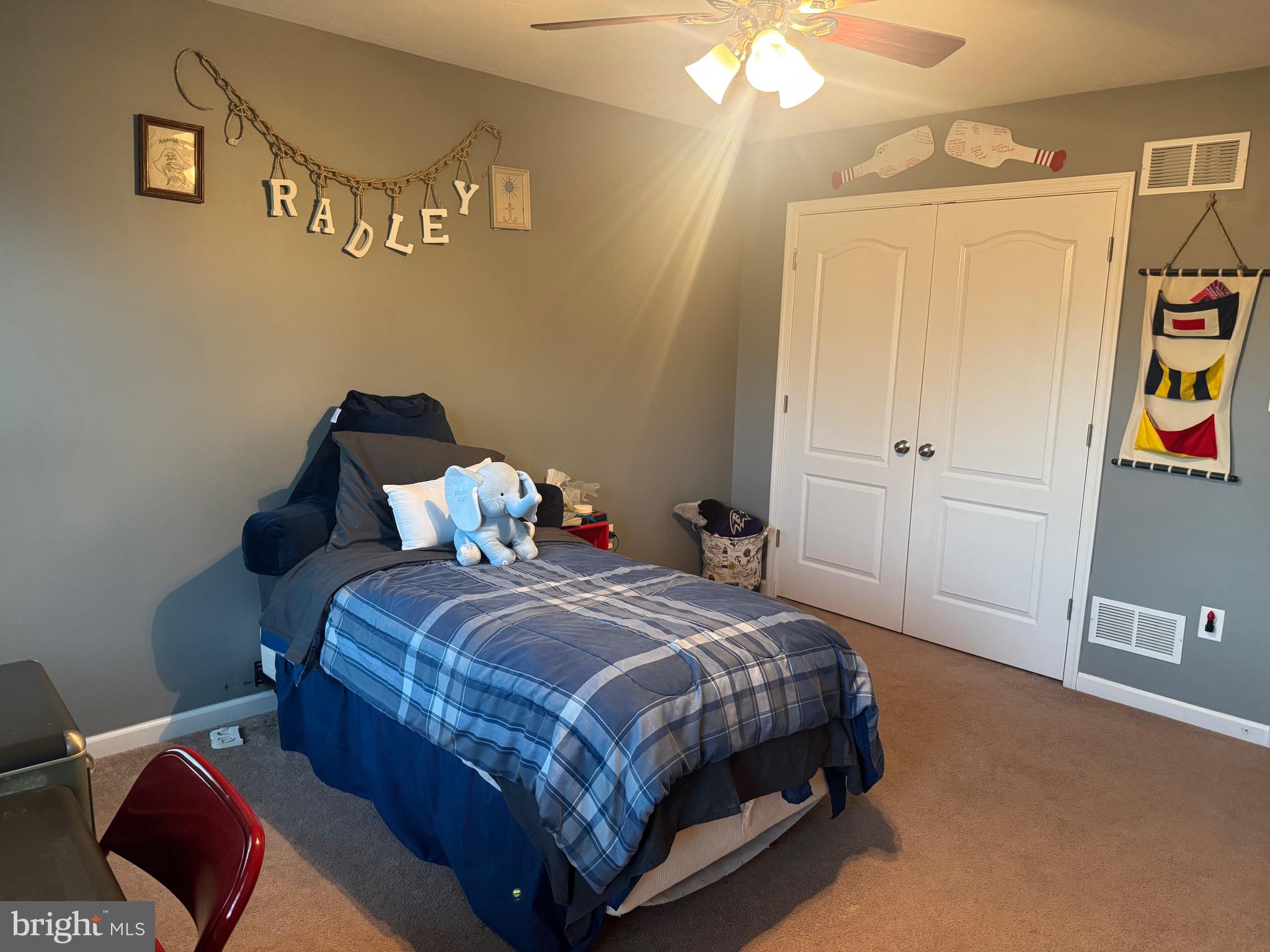 2295 Harney Road Littlestown, PA 17340 - Photo 17 of 37 a bedroom with a bed and a window