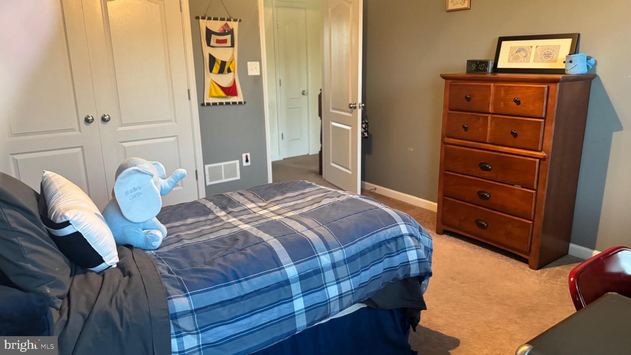 2295 Harney Road Littlestown, PA 17340 - Photo 19 of 37 a bedroom with a bed and dresser