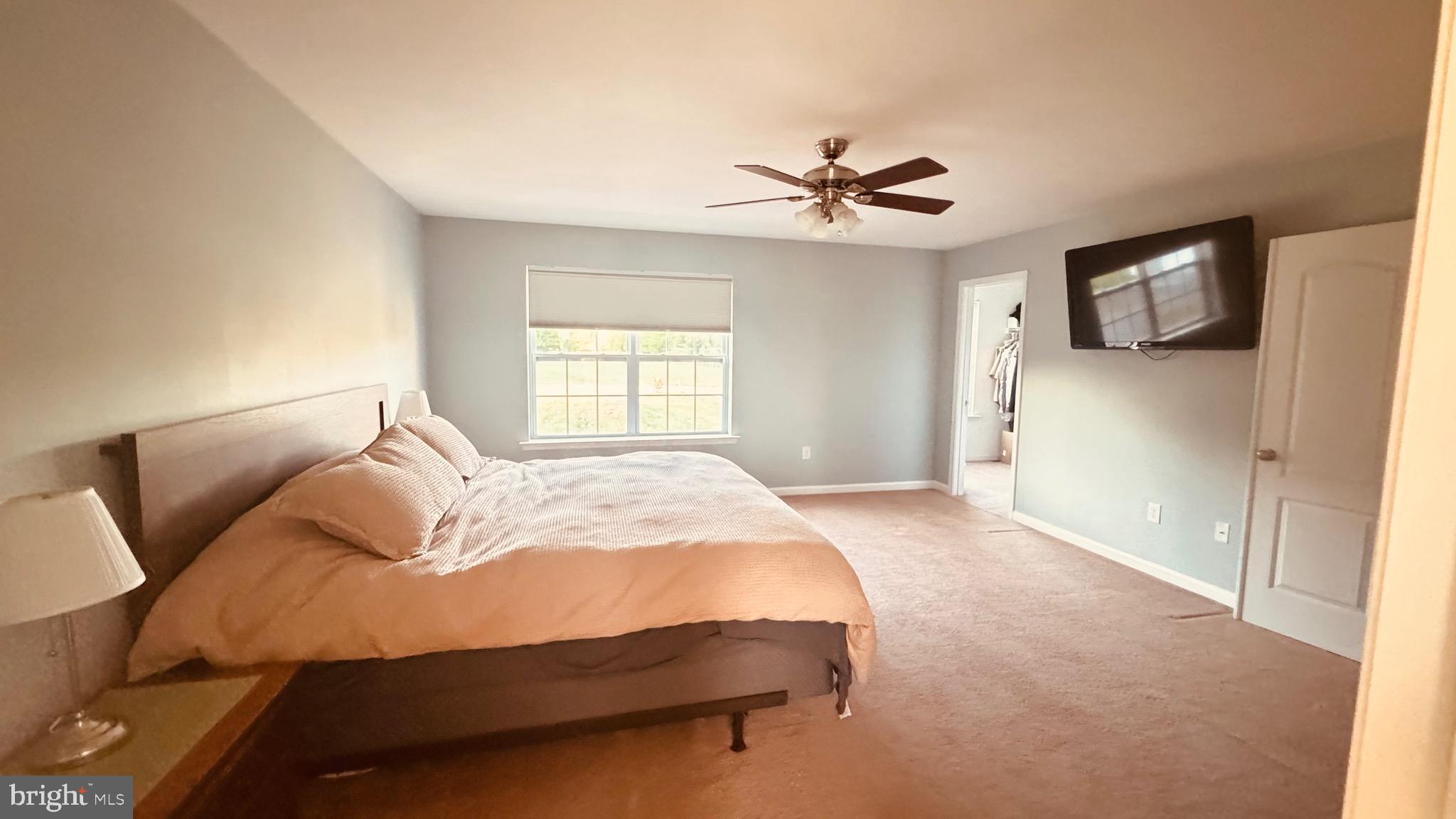 2295 Harney Road Littlestown, PA 17340 - Photo 22 of 37 a bedroom with a bed and a window